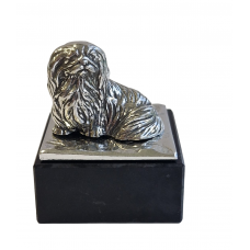 pekingese on marble base