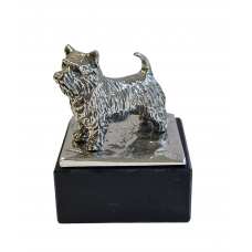 Norwich terrier on marble base